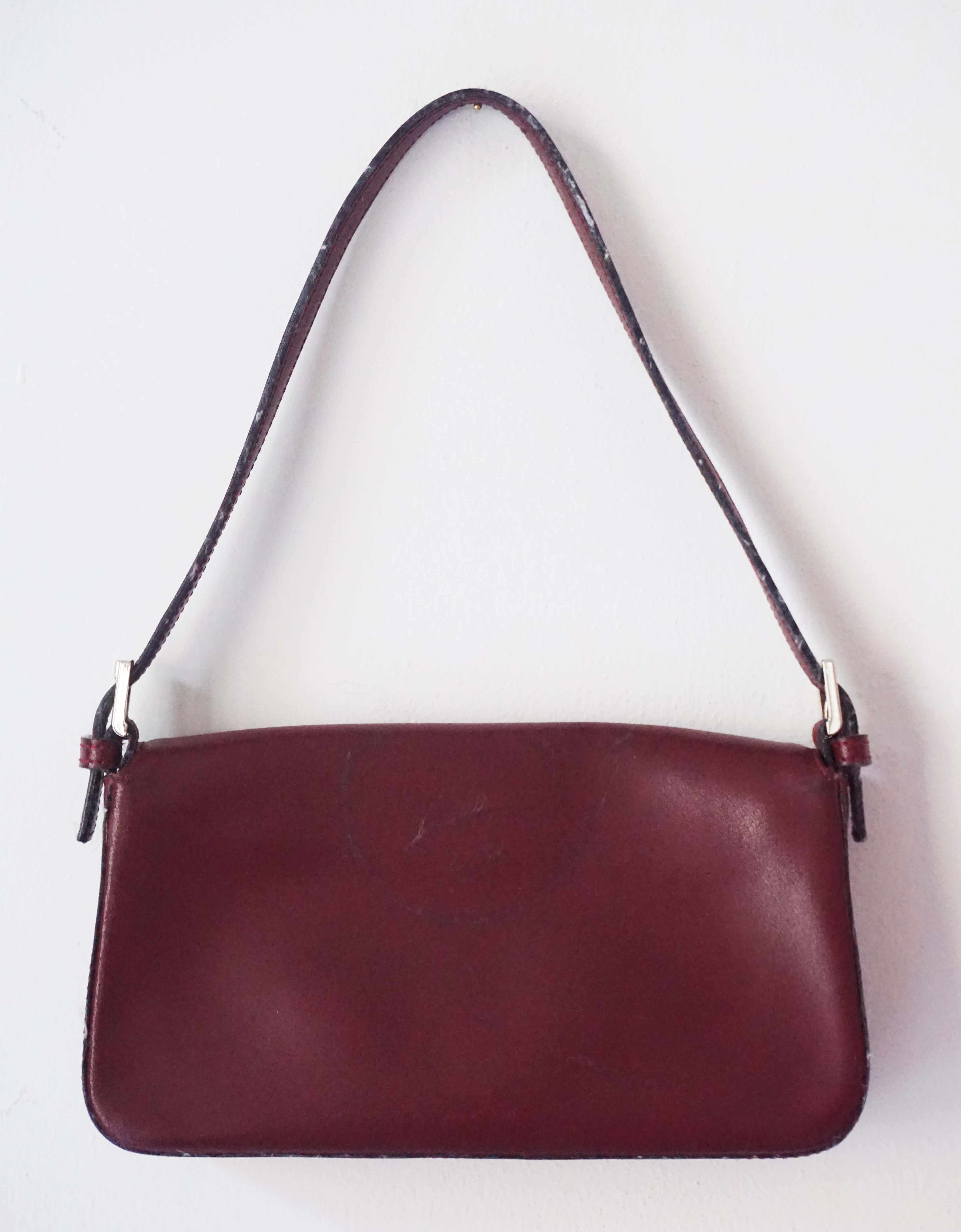 Clutch e tracollina Grilli bordeaux in vera pelle