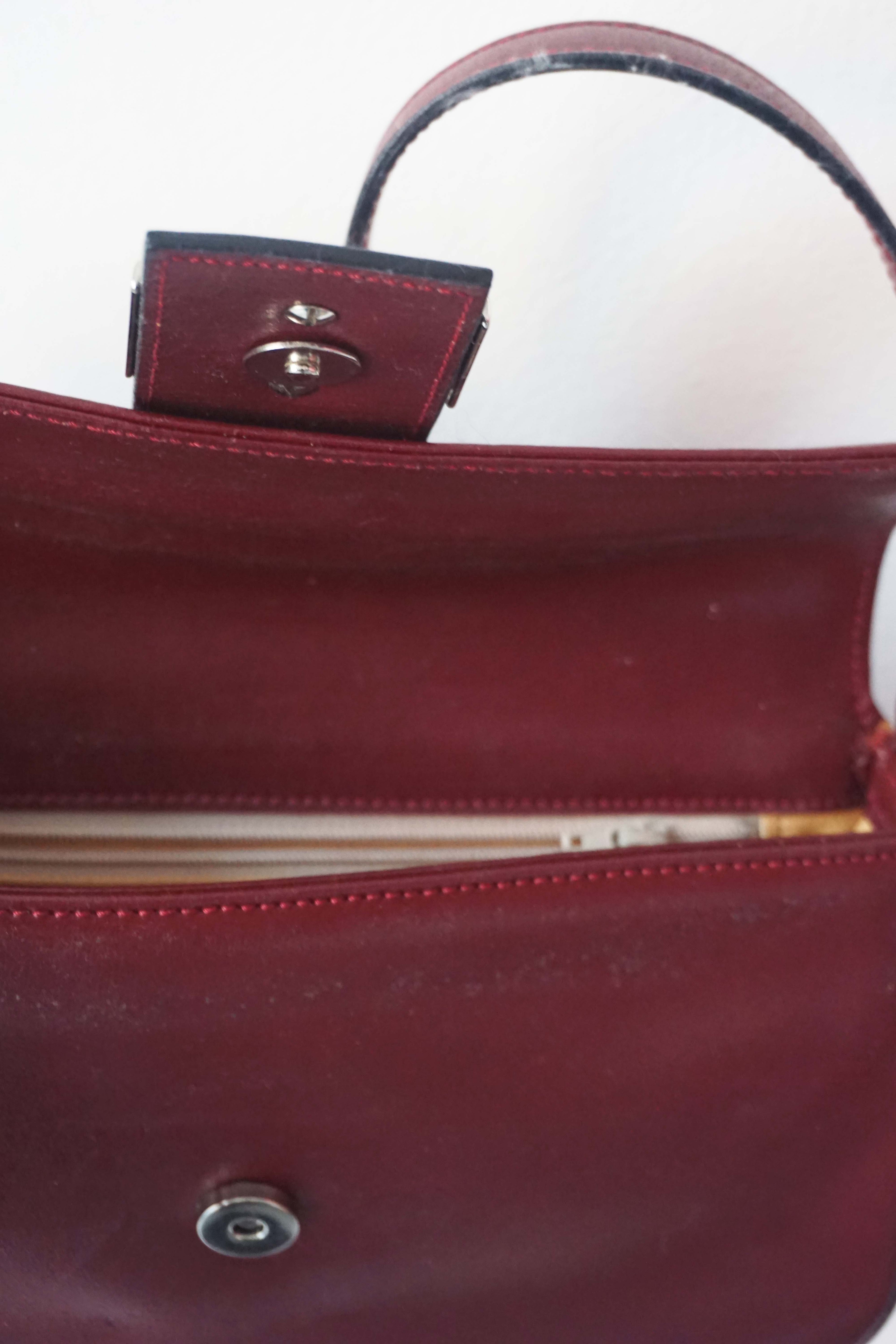 Clutch e tracollina Grilli bordeaux in vera pelle