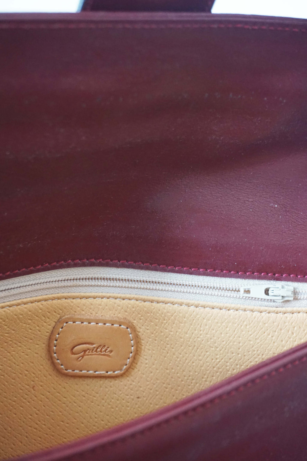 Clutch e tracollina Grilli bordeaux in vera pelle