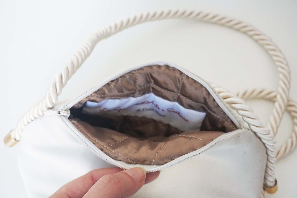 Borsetta rotonda biancha